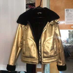 Winter styled coat, with faux fur material inside.